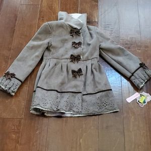 Never worn, tag on, copper key thick winter coat.